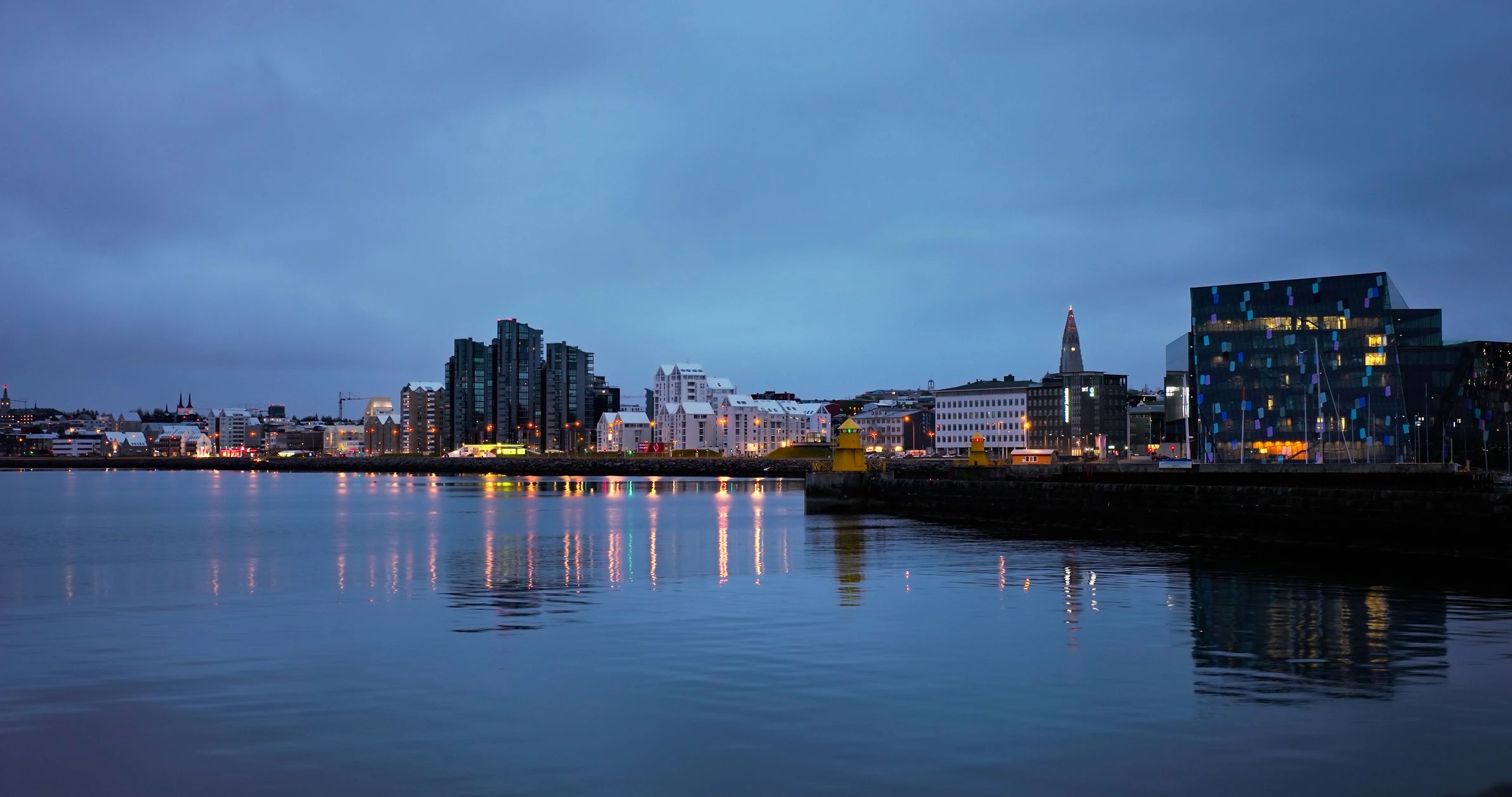 Luxury cityscape at night, representing Olivia Saint Laurent's travel and exclusivity